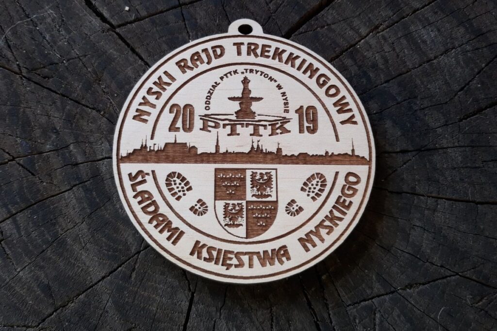 Drewniany medal na Miejski Rajd Rowerowy Śladami Ksistwa Nyskiego.