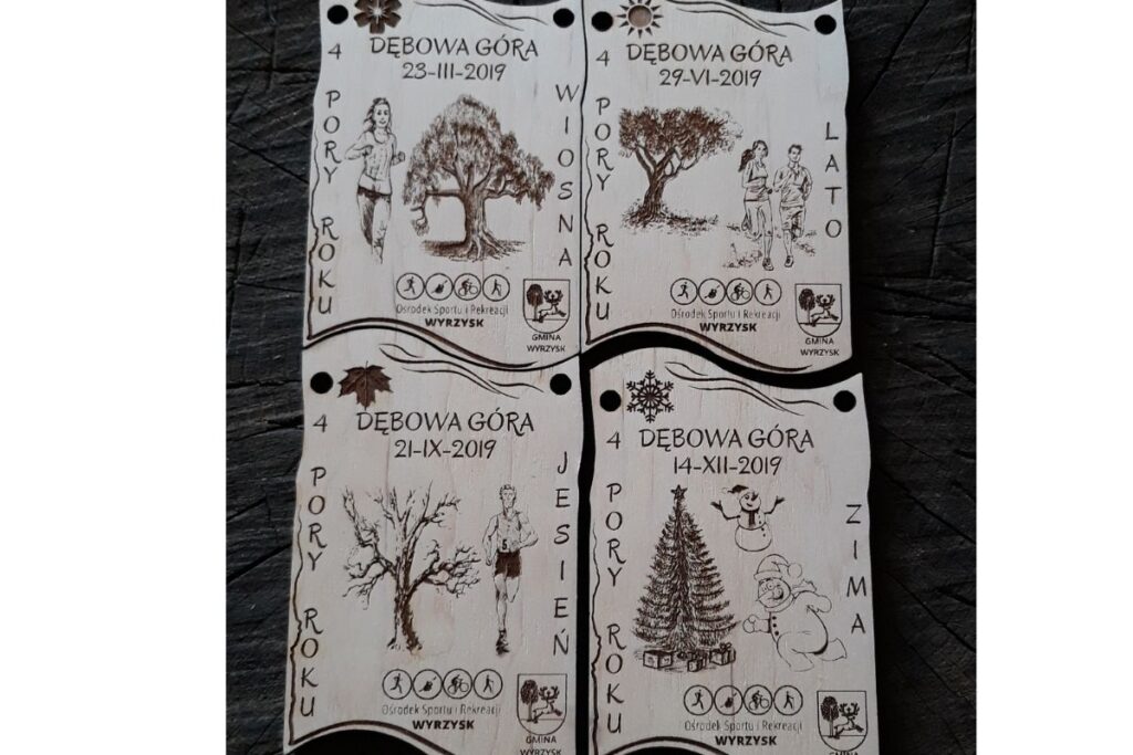 Precyzyjnie docięte drewniane medale składane w jedną całość – ekologiczne trofeum sportowe z motywem biegaczy, chodziarzy, 4 porami roku.